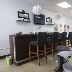Spa-Cio - It is a nail bar! If I can grab a cocktail, it would be added touch.