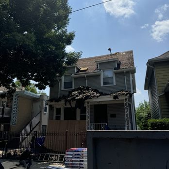 Ever’s Roofing - In progress, front roof was original shingles and new plywood was needed. - Roofing Near Me - Chicago, Illinois