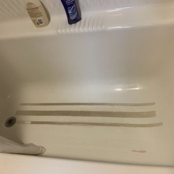 Evergreen Resort - Tub floor of the "renovated" room we paid for - Resorts Near Me - Cadillac, Michigan