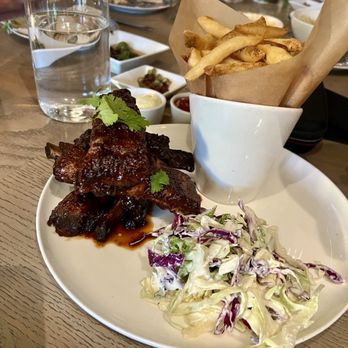 The Daisy Restaurant - HOUSE-SMOKED SPARE RIBS garlic lime slaw, fries - Farmers Market Near Me - Santa Barbara, California