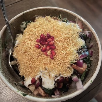 Delhi Accent Innovative Indian Dining - Palak Chaat crispy spinach, pomegranate, yogurt, tamarind & mint chutney, chopped tomato & onions. - Indian Near Me - Ridgewood, New Jersey Delhi Accent Innovative Indian Dining - Palak Chaat crispy spinach, pomegranate, yogurt, tamarind & mint chutney, chopped tomato & onions. - Indian Near Me - Ridgewood, New Jersey