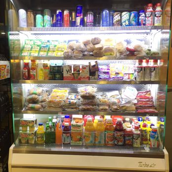 Valero - a refrigerated display case filled with food - Gas Stations Near Me - Miami, Florida Valero - a refrigerated display case filled with food - Gas Stations Near Me - Miami, Florida