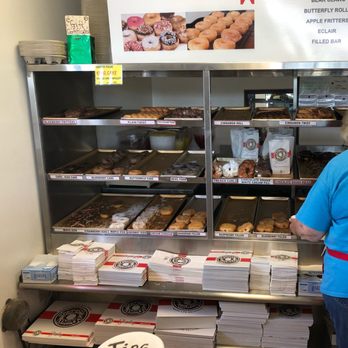 Mr. Donut - a woman standing in front of a display of donuts - Donuts Near Me - Horn Lake, Mississippi Mr. Donut - a woman standing in front of a display of donuts - Donuts Near Me - Horn Lake, Mississippi