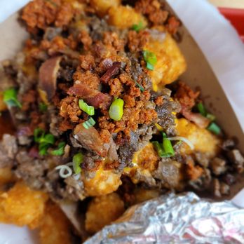 Tacos Y Más - Tater tots with cheese, bacon bits, and meat. I don't know how to pronounce nor spell the actual name of the dish. - Tacos Near Me - Colton, California Tacos Y Más - Tater tots with cheese, bacon bits, and meat. I don't know how to pronounce nor spell the actual name of the dish. - Tacos Near Me - Colton, California