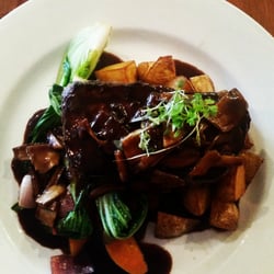 Race Track Cafe - Wonderful porter house steak with mushroom sauce. Cooked to perfection.