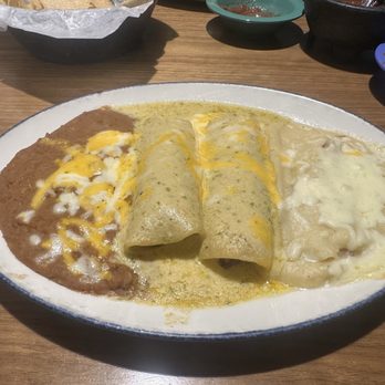 The Plaza - Brisket Deluxe Enchiladas with jalopeno cream sauce - New Mexican Cuisine Near Me - Lubbock, Texas The Plaza - Brisket Deluxe Enchiladas with jalopeno cream sauce - New Mexican Cuisine Near Me - Lubbock, Texas