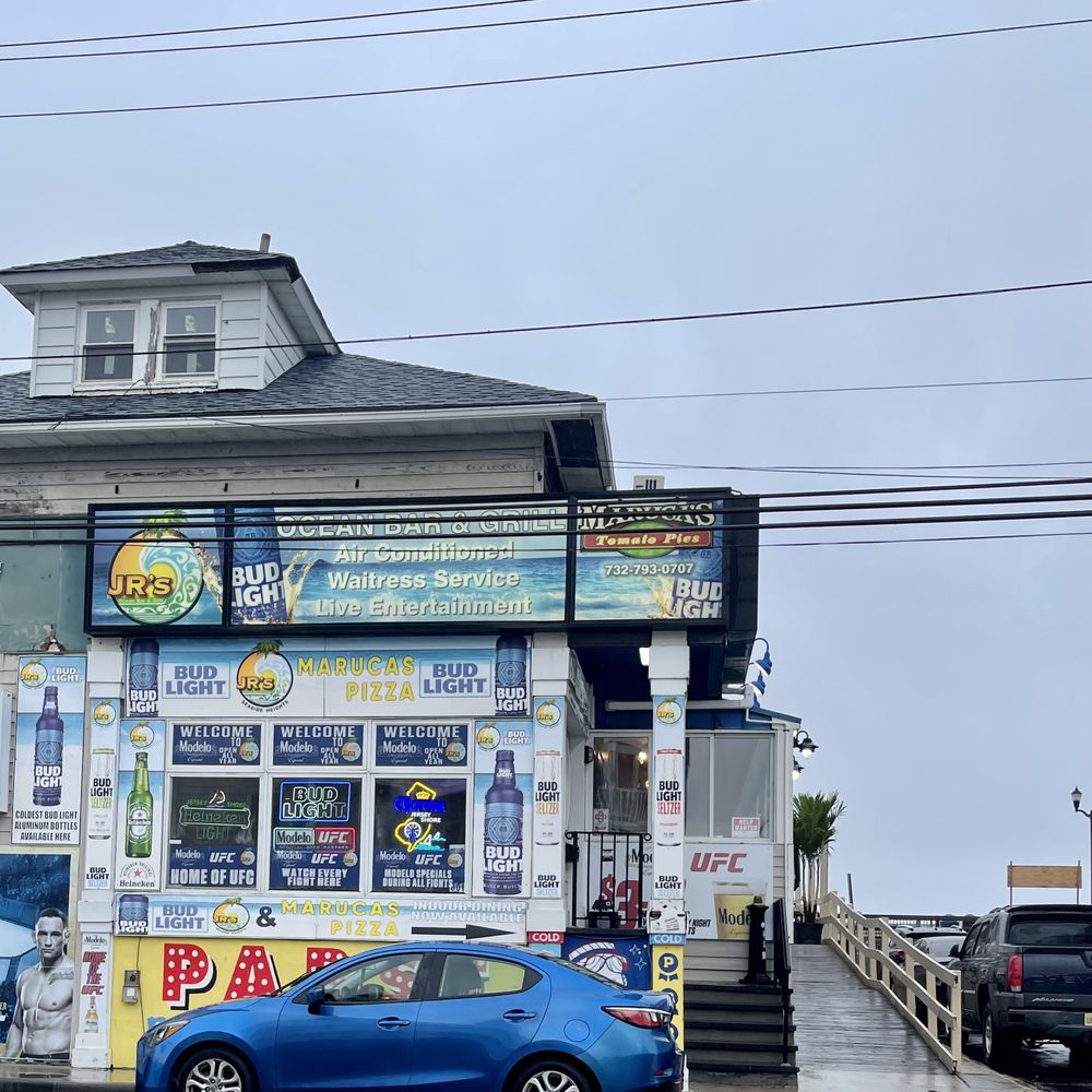 Jr's Ocean Bar and Grill - a blue car parked in front of it - Cheesesteaks Near Me - Seaside Heights, New Jersey Jr's Ocean Bar and Grill - a blue car parked in front of it - Cheesesteaks Near Me - Seaside Heights, New Jersey