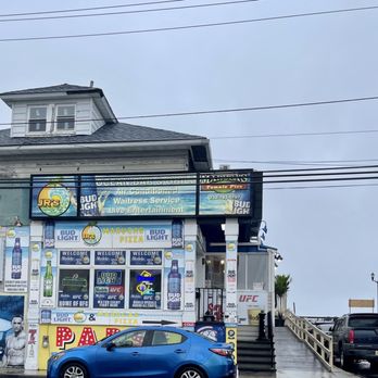 Jr's Ocean Bar and Grill - a blue car parked in front of it - Cheesesteaks Near Me - Seaside Heights, New Jersey Jr's Ocean Bar and Grill - a blue car parked in front of it - Cheesesteaks Near Me - Seaside Heights, New Jersey