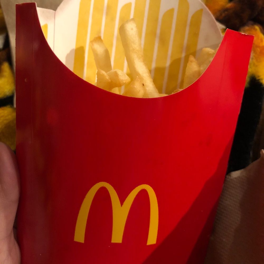 McDonalds - a hand holding a box of french fries - Fast Food Near Me - Northbrook, Illinois McDonalds - a hand holding a box of french fries - Fast Food Near Me - Northbrook, Illinois