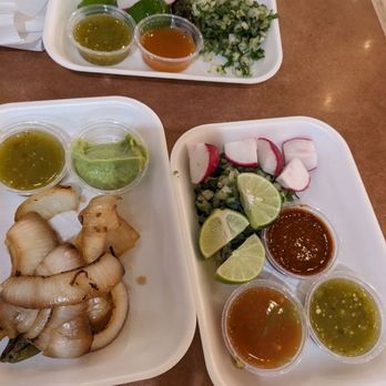 Tacos Calafia - Accoutrements grilled onions, salsas, limes, radish, guac - Tacos Near Me - Gilbert, Arizona