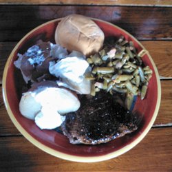 The Lair Bar and Grill - Here's another steak special night special - cooked to order - with a baked potato and green beans.