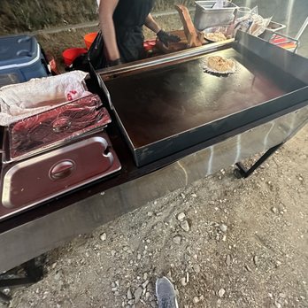 Tacos El Amigo - Griddle cooking up fresh tortillas and heating up cheeses and meats - Street Vendors Near Me - Fontana, California Tacos El Amigo - Griddle cooking up fresh tortillas and heating up cheeses and meats - Street Vendors Near Me - Fontana, California