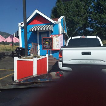 Espresso Evergreen - a white truck parked in front of a blue and red building - Coffee & Tea Near Me - Evergreen, Colorado Espresso Evergreen - a white truck parked in front of a blue and red building - Coffee & Tea Near Me - Evergreen, Colorado