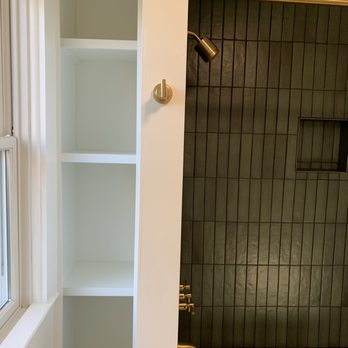 Kit Renovation - Shower and shelving after reno - General Contractors Near Me