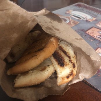 El Chuzo Bbq - That's supposed to be garlic bread but it's burn hamburger buns with a little or garlic unbelievable. - Latin American Near Me - Tampa, Florida El Chuzo Bbq - That's supposed to be garlic bread but it's burn hamburger buns with a little or garlic unbelievable. - Latin American Near Me - Tampa, Florida