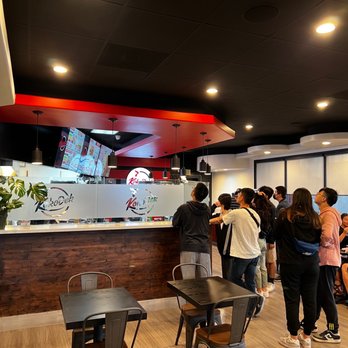 Kokodeck - a large group of people standing in line - Japanese Near Me - Anaheim, California Kokodeck - a large group of people standing in line - Japanese Near Me - Anaheim, California