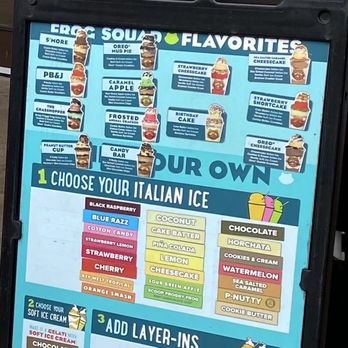 Jeremiah's Italian Ice - Menu board on the sidewalk near the line - Desserts Near Me - Gainesville, Florida