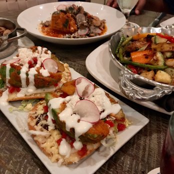 Caracol - Fried avocados and vegetable paella - Seafood Near Me - Houston, Texas Caracol - Fried avocados and vegetable paella - Seafood Near Me - Houston, Texas