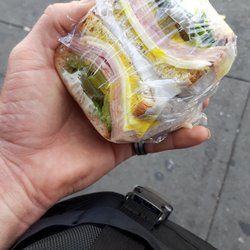 Yick's Liquors - Ham and cheese on rye. Just made and wrapped to go. Packaged up just right for me. Can't stand the fancy wrapped.