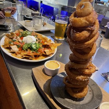 Yard House - Chicken Nachos & Onion rings - New American Near Me - Irvine, California