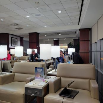 United Club - Terminal E - two people sitting in the lounge area - Airport Lounges Near Me - Houston, Texas United Club - Terminal E - two people sitting in the lounge area - Airport Lounges Near Me - Houston, Texas