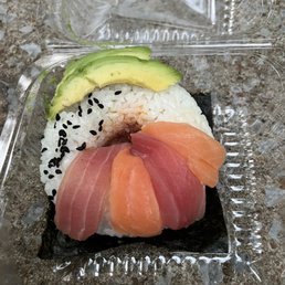 Never seen a sushi doughnut before. I'm saving it for a snack later. Never seen a sushi doughnut before. I'm saving it for a snack later.
