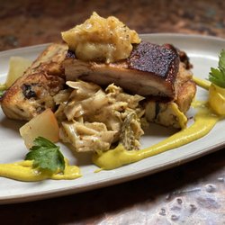 Pine Grove Hall - Braised Pork Belly |    
Pan fried succulent pork belly with a savory mushroom bread pudding, mustard creamed cabbage & apple rosemary