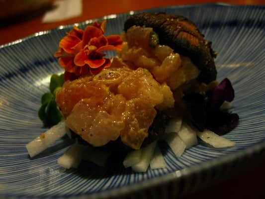 Photo of Sebo - San Francisco, CA, US. Grilled mushrooms, hamachi, with edible flower