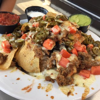Magellans On Main St - Pork Nachos - Pizza Near Me - Waukesha, Wisconsin