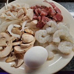 Asian Garden - Beef, shrimp, mushrooms, onions, egg. Tsp of hot oil, mongol, and garlic sauce.