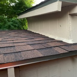 Flash and roofing materials over the tool part of the shed.