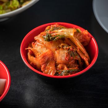 Bonchon Glenview - a bowl of kimak and chopsticks - Korean Near Me - Glenview, Illinois Bonchon Glenview - a bowl of kimak and chopsticks - Korean Near Me - Glenview, Illinois