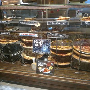 Mikey's Late Night Slice - Display of pizza options - Bars Near Me - Columbus, Ohio