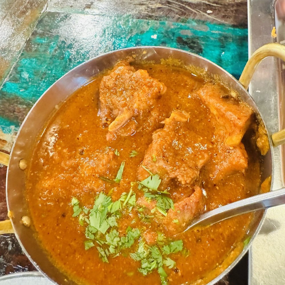 Avakai goat curry - so flavorful and fall off the bone meat! The heat was there but doesn't overwhelm the delicious flavor Avakai goat curry - so flavorful and fall off the bone meat! The heat was there but doesn't overwhelm the delicious flavor