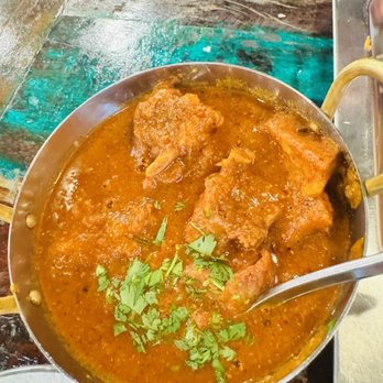 Godavari Denver - Avakai goat curry - so flavorful and fall off the bone meat! The heat was there but doesn't overwhelm the delicious flavor - Indian Near Me - Centennial, Colorado