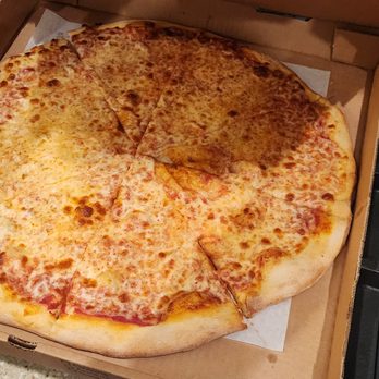 Benny's Bada Bing - Plain pizza, pretty tasty and nice products, sauce and cheese.  a bit undercooked and doughy.  Not the worse in the area. - Italian Near Me - Venice, Florida