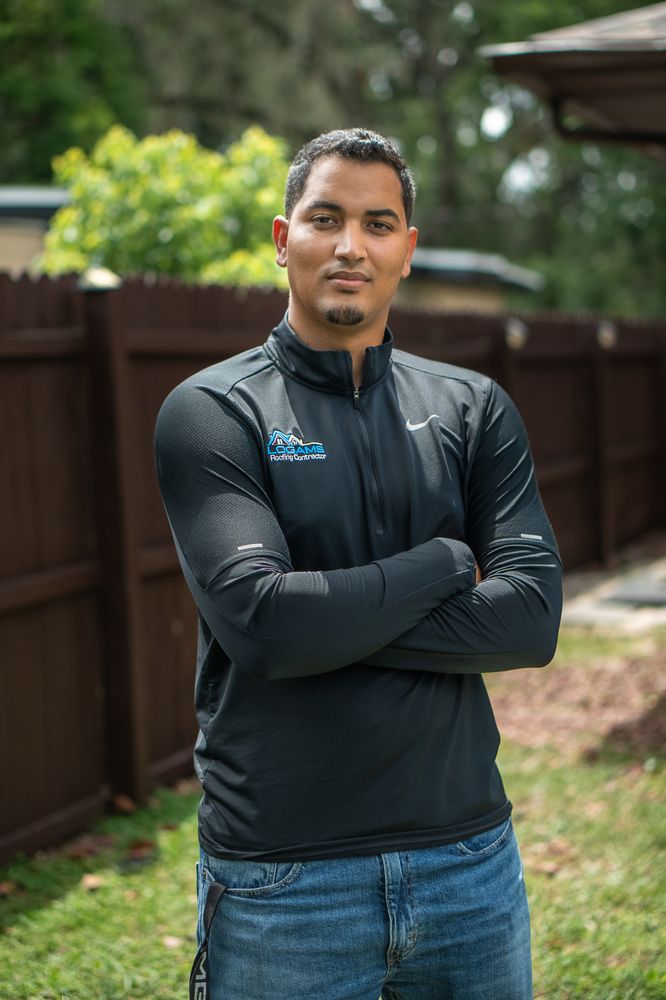 Slide of Logams Roofing Contractors