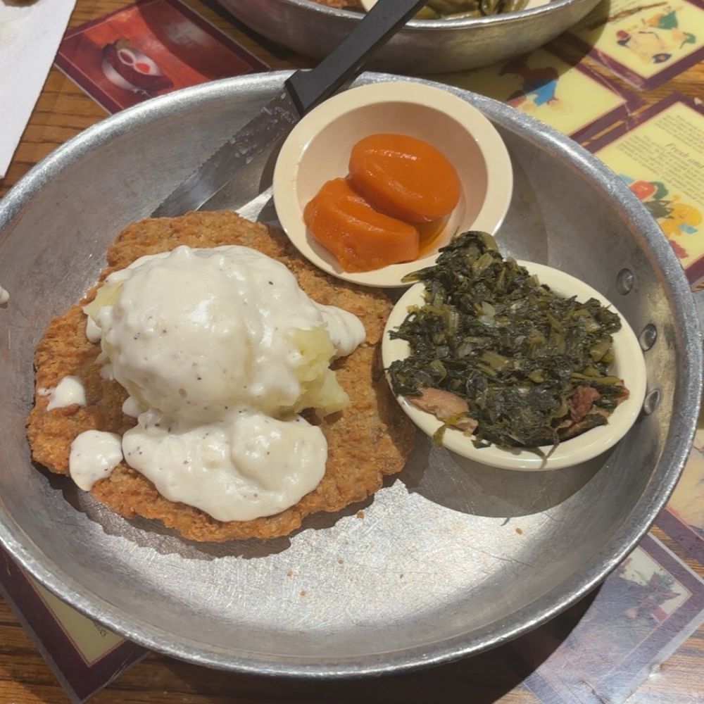 Lamberts Cafe - We each had chicken fried steak, I had greens and candied yams, he had corn and green beans. - American Near Me - Sikeston, Missouri Lamberts Cafe - We each had chicken fried steak, I had greens and candied yams, he had corn and green beans. - American Near Me - Sikeston, Missouri