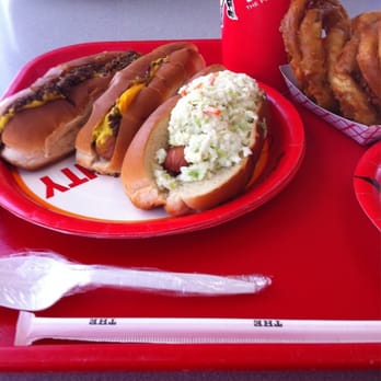 The Varsity - Chili cheese, Cole slaw dogs and onion rings plus house orange drank - Burgers Near Me - Atlanta, Georgia The Varsity - Chili cheese, Cole slaw dogs and onion rings plus house orange drank - Burgers Near Me - Atlanta, Georgia