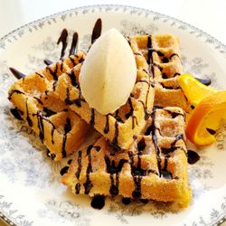 Relish Café and Confections - Churro Waffle - with chocolate sauce, cinnamon sugar and vanilla ice cream