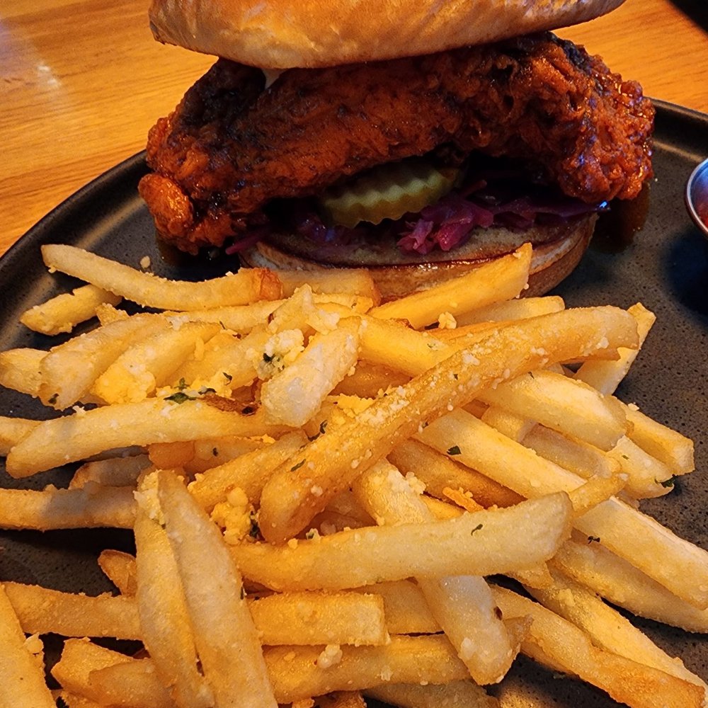 The Operators Club - chicken sandwich and fries - Sports Bars Near Me - Dallas, Texas The Operators Club - chicken sandwich and fries - Sports Bars Near Me - Dallas, Texas
