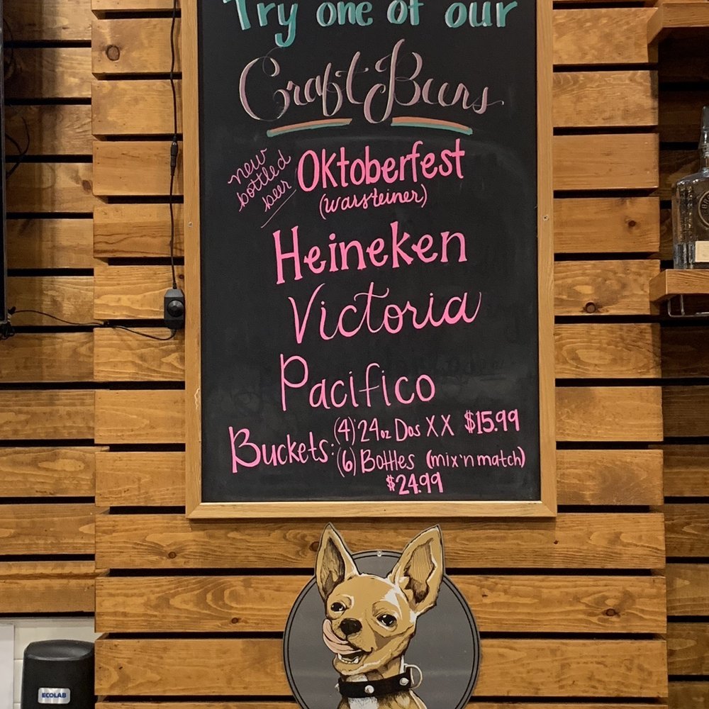AWSOM - Cute little sign in the bar the puppy reminded me of my Chorkie - Chicken Wings Near Me - Paramount, California