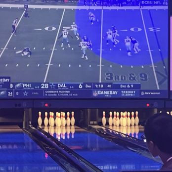 Round1 - Watching someone bowl along with watching on the screen two teams that won't make the 2025 NFL Super Bowl - Arcades Near Me - San Francisco, California Round1 - Watching someone bowl along with watching on the screen two teams that won't make the 2025 NFL Super Bowl - Arcades Near Me - San Francisco, California