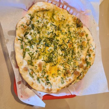 Himalaya Restaurant - Garlic naan (one order yields one naan, this is 2 orders of naan) - Indian Near Me - Houston, Texas