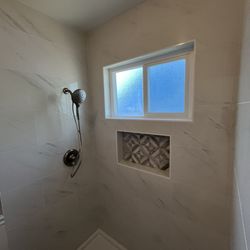 Floor & Decor - Large format tile marble  inlay / window surround