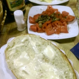 Ricotta spinach and pistachio raviloi, pomodoro and olive salad,    and artichoke bruschetta.