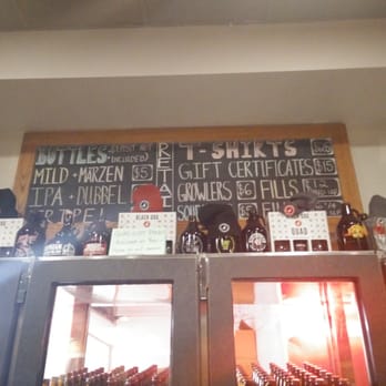 Red Collar Brewing Company - a display of beer bottles - Breweries Near Me - Kamloops, British Columbia Red Collar Brewing Company - a display of beer bottles - Breweries Near Me - Kamloops, British Columbia