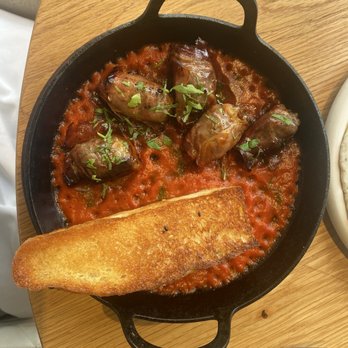 Clio - Merguez Sausage Stuffed Dates - Mediterranean Near Me - Omaha, Nebraska Clio - Merguez Sausage Stuffed Dates - Mediterranean Near Me - Omaha, Nebraska