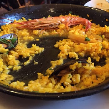 Tuscania - Liquid at bottom of paella - Mediterranean Near Me - Barcelona, B Tuscania - Liquid at bottom of paella - Mediterranean Near Me - Barcelona, B