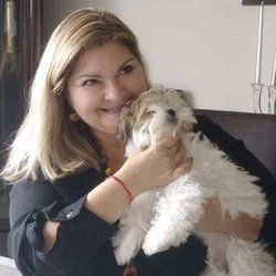Robin's Pet Sitting Service - Robin and a fur baby.